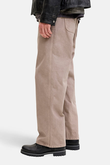 Beige broek van JACK & JONES JEANS INTELLIGENCE, met wijde pijpen en zwarte schoenen.
