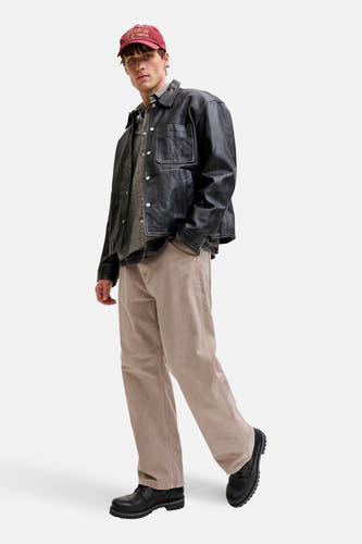 Pantalon beige de JACK & JONES JEANS INTELLIGENCE, avec des jambes larges et des points visibles.