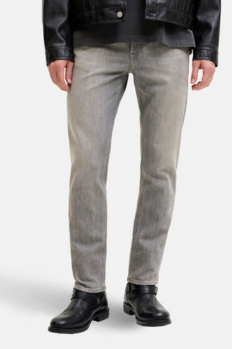 Rechte grijze jeans van JACK & JONES JEANS INTELLIGENCE, met lichte wassing en zwarte laarzen.