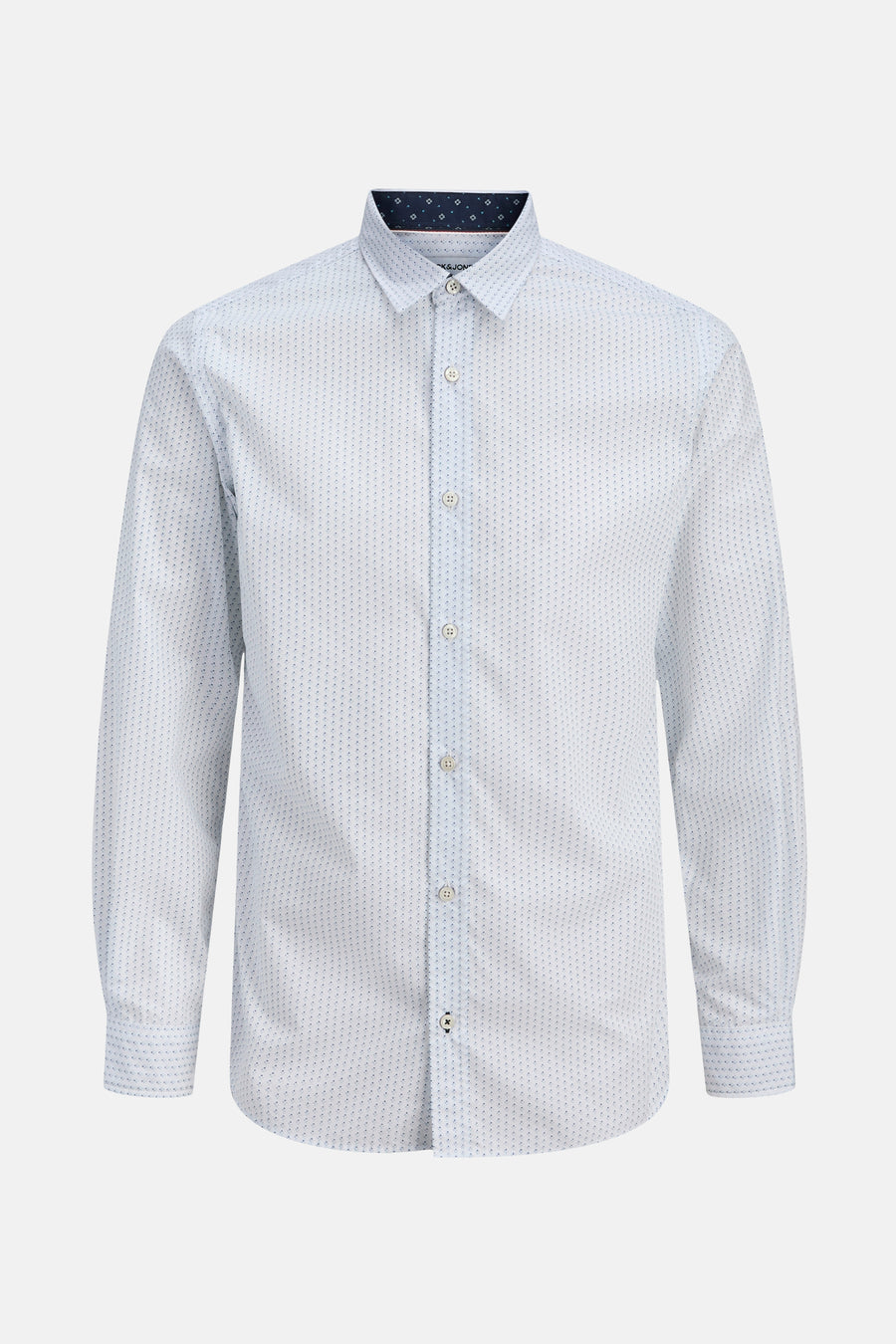 Wit overhemd met blauwe stippen.