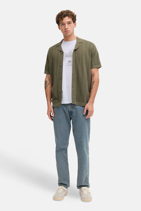 Wit T-shirt met korte mouwen van JJREBEL, met een print van een plant in een bloempot.