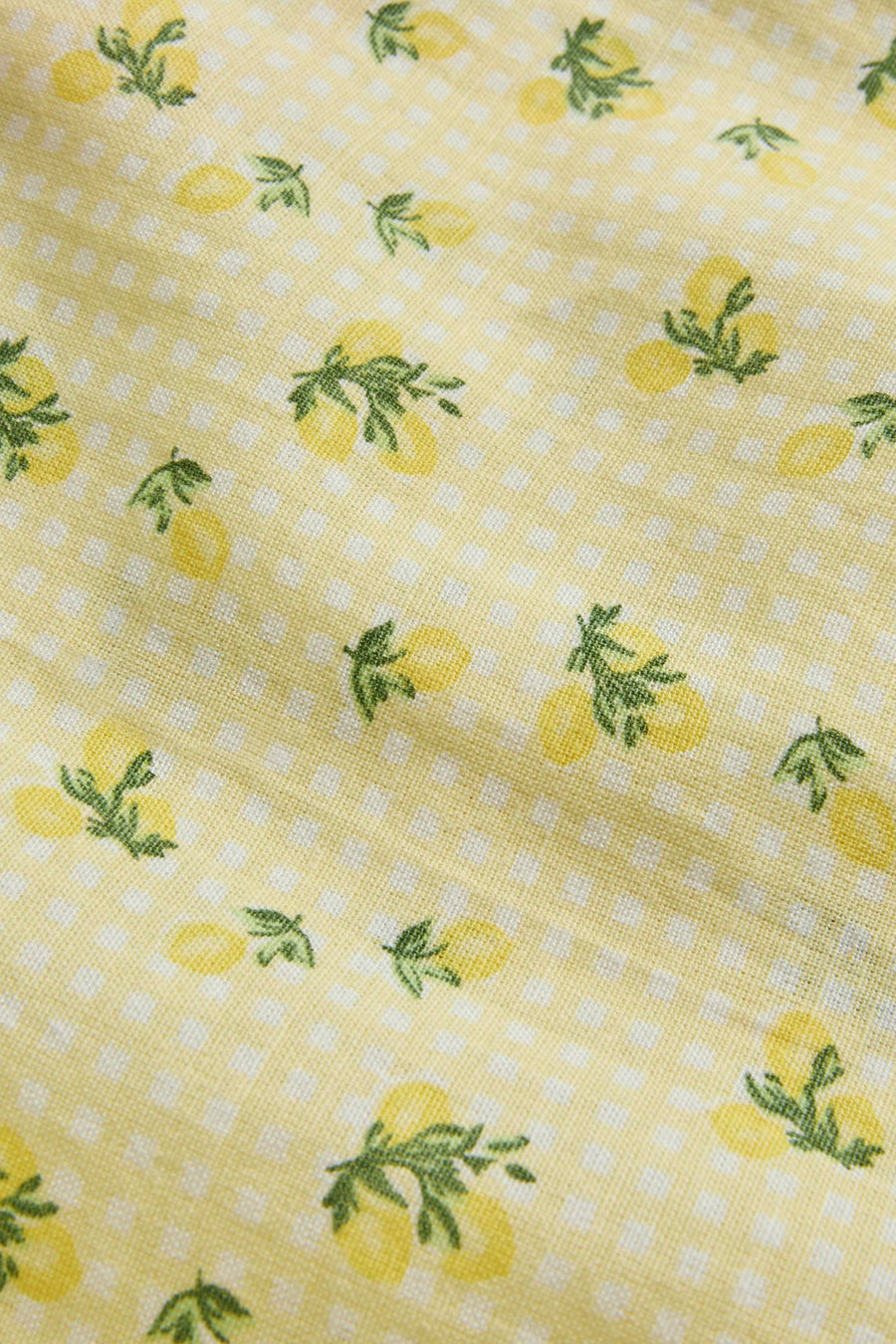 Robe jaune de JJXX avec un motif à carreaux blancs et de petits motifs de citrons.