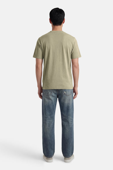 T-shirt vert à manches courtes ORIGINALS BY JACK & JONES, vu de dos, associé à un jean bleu.