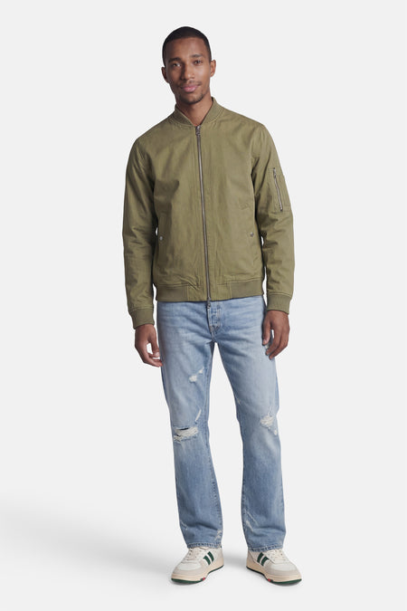 Bomber court vert de CORE BY JACK & JONES avec fermeture éclair, poignets côtelés et poches.