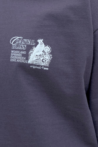 T-shirt bleu de ORIGINALS BY JACK & JONES avec imprimé blanc d'un oiseau et le texte "Coastal Bliss".