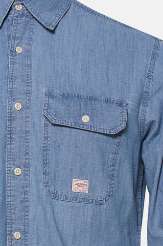 Jeanshemd van blauw denim van PREMIUM BLUE by JACK & JONES, met borstzak en knoopsluiting.