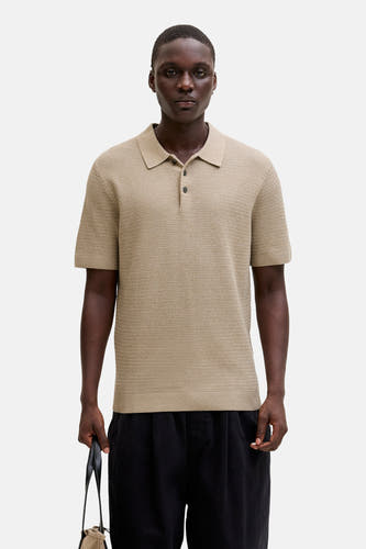 Beige polo met korte mouwen van PREMIUM BLUE by JACK & JONES, met een fijne textuur en zwarte knopen.
