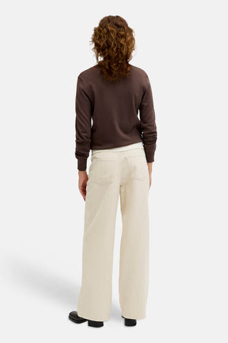 Pantalon écru JJXX, à jambes larges et motif à fines rayures subtil, vu de dos.