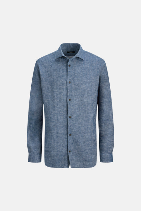 Chemise bleue à manches longues de PREMIUM by JACK & JONES, avec une subtile structure à chevrons et des boutons foncés.