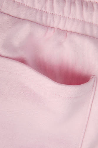 Pantalon de jogging rose de JJXX, avec taille élastique et poche latérale en gros plan.
