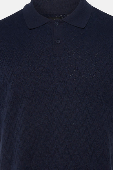 Polo bleue de PREMIUM by JACK & JONES, avec un motif à carreaux subtil et une fermeture à boutons courte.