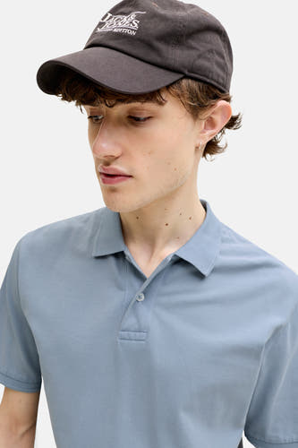 Blauw poloshirt van PREMIUM BLUE by JACK & JONES, met korte mouwen en een enkele knoop.
