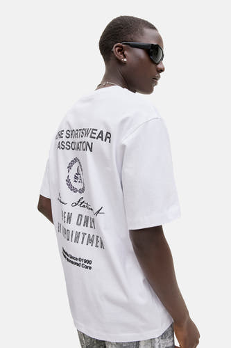 Wit T-shirt van CORE BY JACK & JONES, met korte mouwen en tekstprint op de rug.