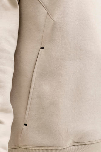 Beige sweater van CORE BY JACK & JONES, met een pocketdetail en ribgebreide zoom.