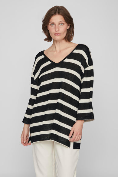Gilet rayé noir et blanc avec col V de VILA®, avec des manches trois-quarts et une longueur régulière.
