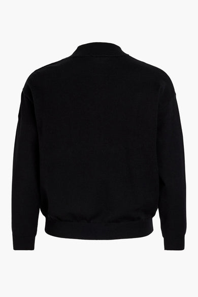 Pull noir à col rond de VILA®, vue de dos, tissu lisse avec bords-côtes au col, aux manches et à l'ourlet