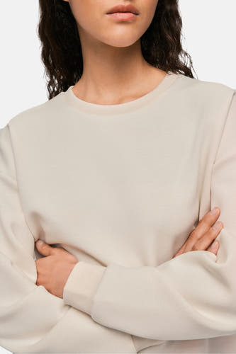 Gilet beige de VILA®, avec des manches longues et des épaules croisées sur la poitrine, cropped.