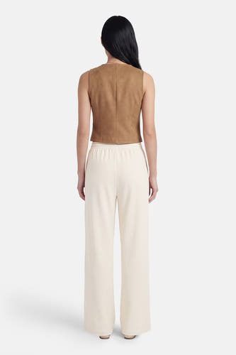 Pantalon beige de VILA®, à jambes larges et taille élastique, vu de dos.