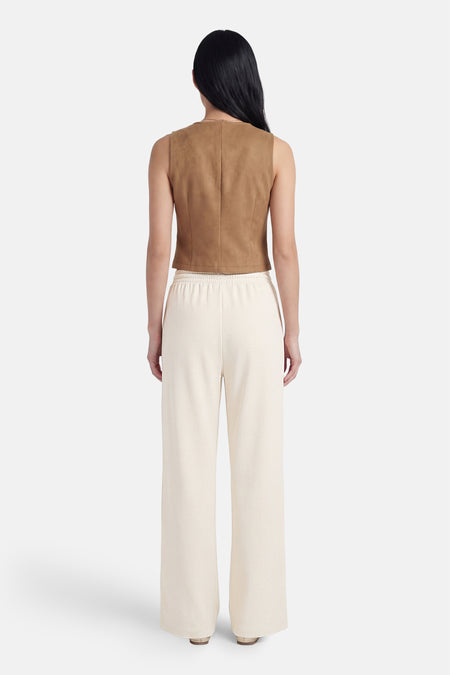 Pantalon beige de VILA®, à jambes larges et taille élastique, vu de dos.
