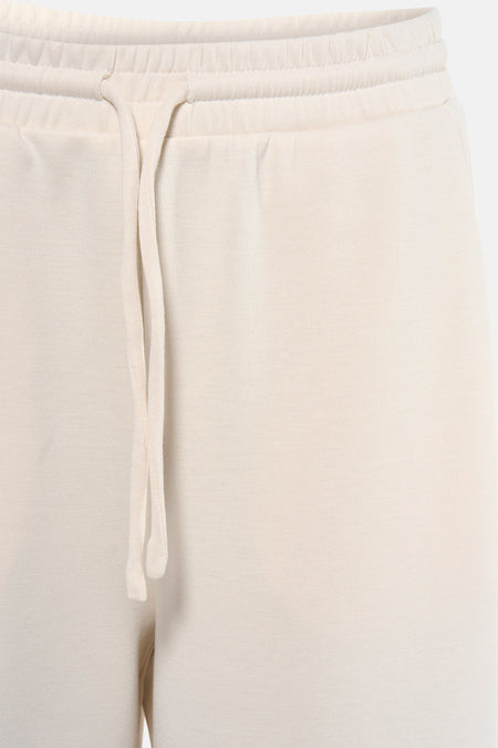 Pantalon de couleur beige de VILA, avec cordon de serrage à la taille.