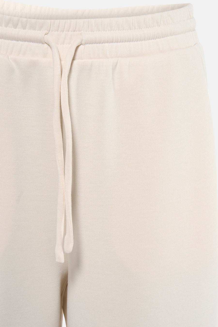 Pantalon de couleur beige de VILA, avec cordon de serrage à la taille.