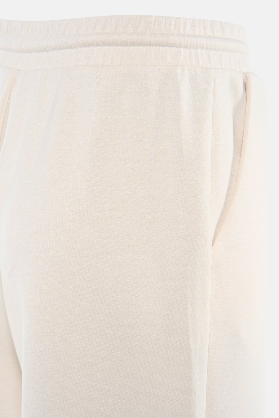 Pantalon de couleur beige de VILA, avec taille élastique et poches latérales.
