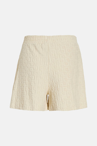 Crème court de VILA® avec un motif géométrique et une ceinture élastique.