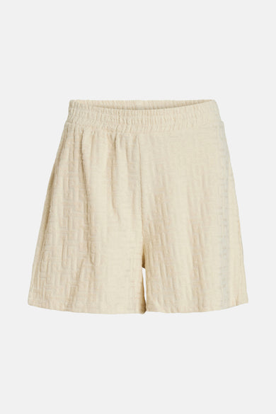 Crème court de VILA® avec un motif géométrique et une ceinture élastique.