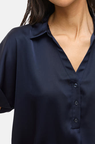 Blauwe blouse met korte mouwen van VILA®, met knoopsluiting en een kraagje.