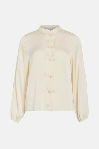 Blouse écru à longues manches de VILA®, avec une fermeture chinoise traditionnelle.
