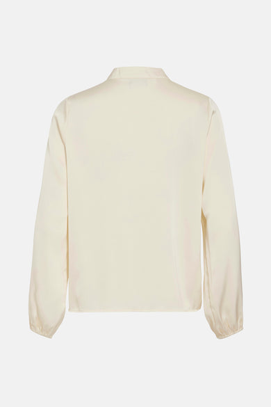 Chemise écru à manches longues de VILA, dos visible avec un col et des manches bouffantes.