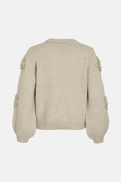 Gilet beige avec col rond de VILA, doté de fleurs décoratives sur les manches et de longues manches bouffantes.