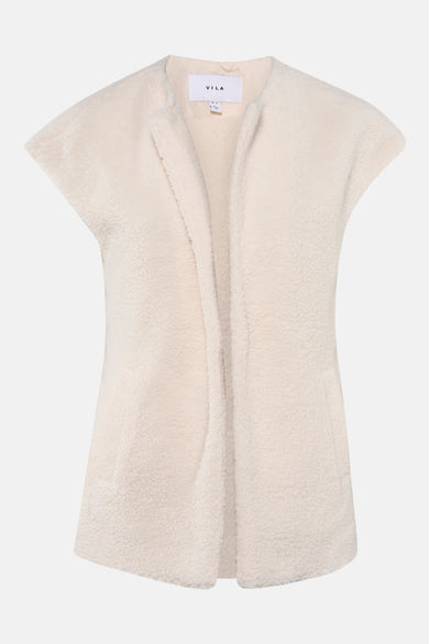 Manteau beige de VILA®, avec une texture pelucheuse douce, sans fermeture, vu de dos.