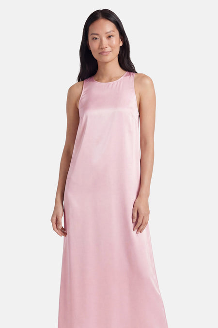 Robe sans manches rose de VILA® avec un aspect satiné brillant et une coupe droite et simple.