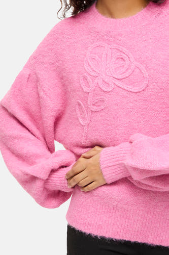 Roze trui met ronde hals van VILA®, met gebreide bloemapplicatie op de voorkant.