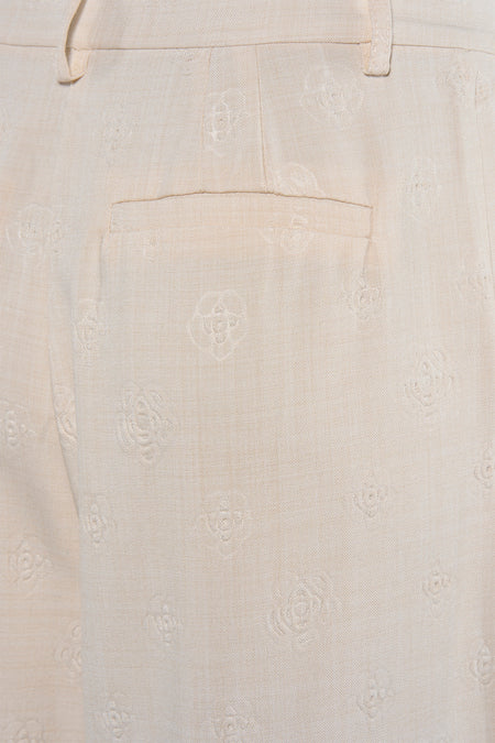 Pantalon beige de VILA®, avec motif rose subtil et une poche arrière.