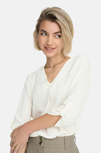 Witte blouse van JDY, met lange mouwen en een gekruiste v-hals.
