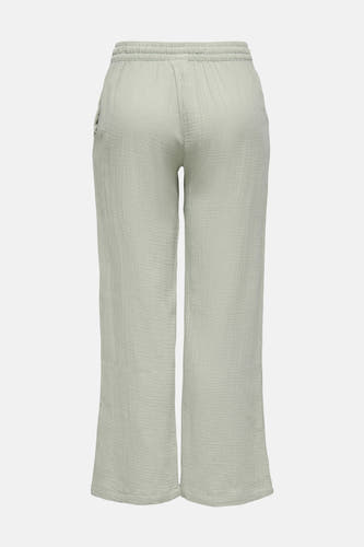Pantalon vert de JDY, avec une texture crêpe et une ceinture élastique, vu de derrière.