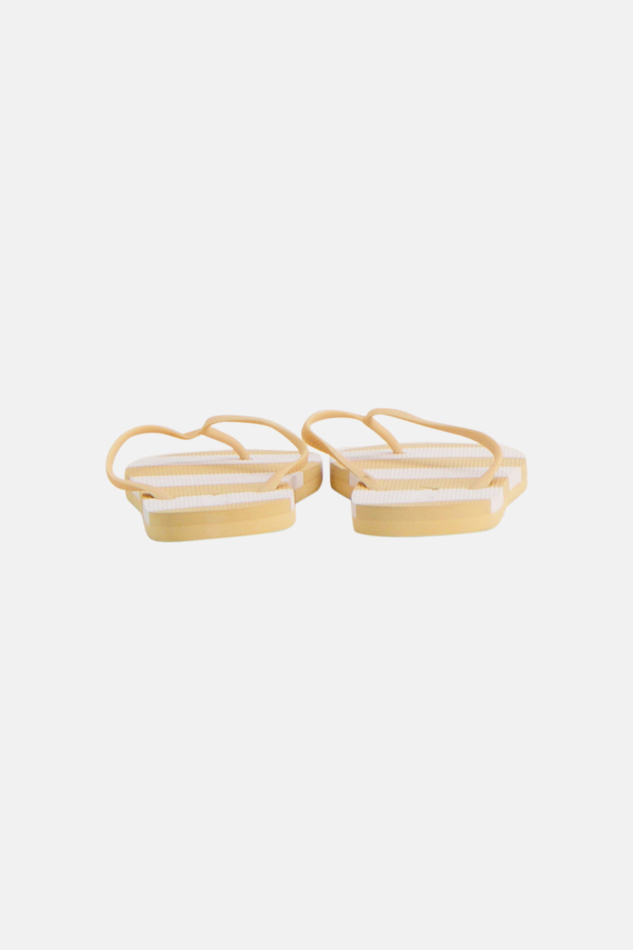 Gele slippers van ONLY® met witte strepen en lichtgele bandjes, zijdelings getoond.