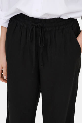 Pantalon noir de JDY, avec cordon de serrage à la taille et poche latérale.