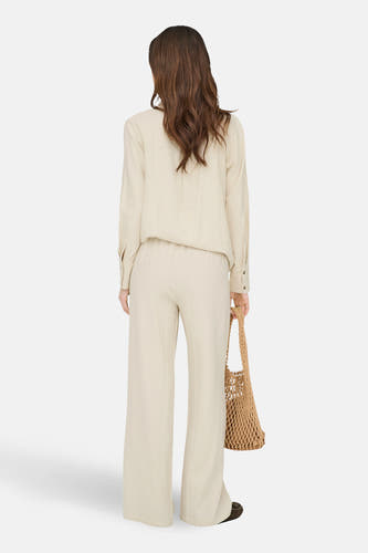 Pantalon beige de JDY, avec jambes larges et taille élastique.