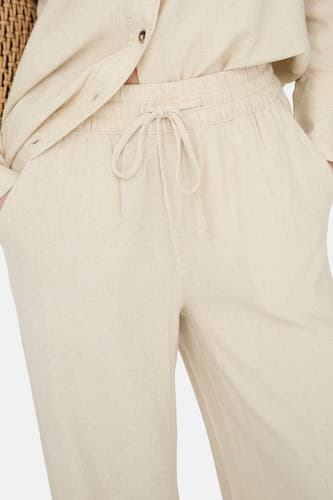 Pantalon beige de JDY, avec cordon de serrage et poches latérales.