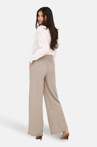 Pantalon beige de JDY, avec jambes larges et taille élastique, vue de dos.