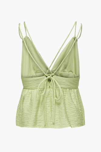 Mouwloze groene blouse van ONLY, met gekruiste bandjes en strikdetail op de rug.
