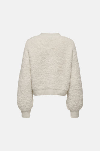 Cardigan écru de JDY, avec une douce texture tricotée et des manches bouffantes, vu de derrière.
