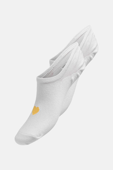 Chaussettes blanches d'ONLY, avec un petit cœur jaune dessus.