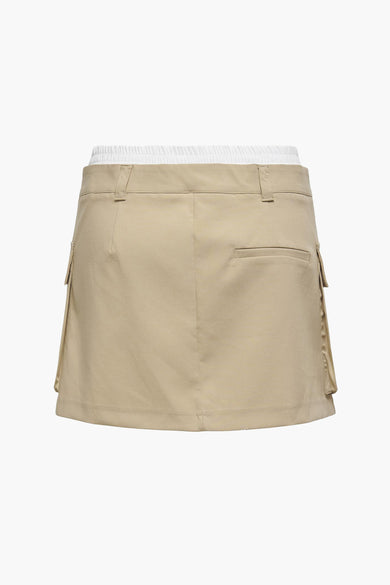 Beige korte rok van ONLY®, met riemlussen en een achterzak.