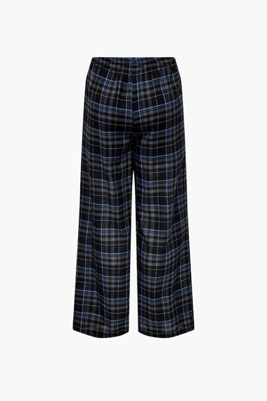 Blauwe broek van ONLY met een ruitpatroon in zwart, grijs en blauw, vanuit de achterkant gezien.
