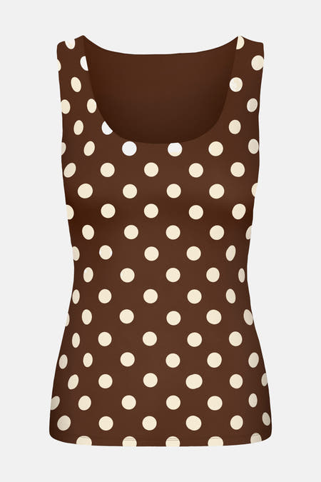 T-shirt sans manches de ONLY, avec un motif à points sur toute la surface et un fond uni.