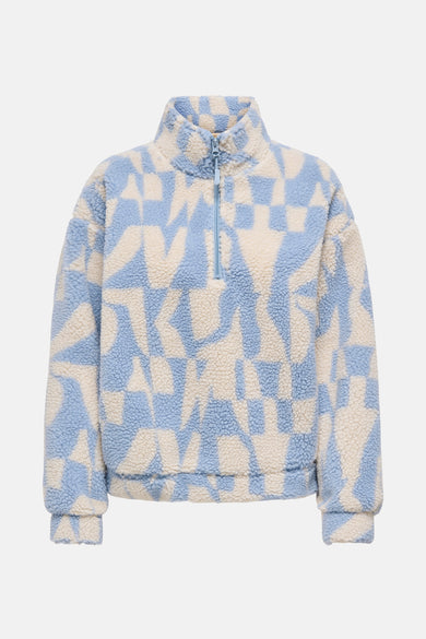 Fausse fourrure bleue ONLY avec un motif de bloc abstrait et une fermeture éclair courte.